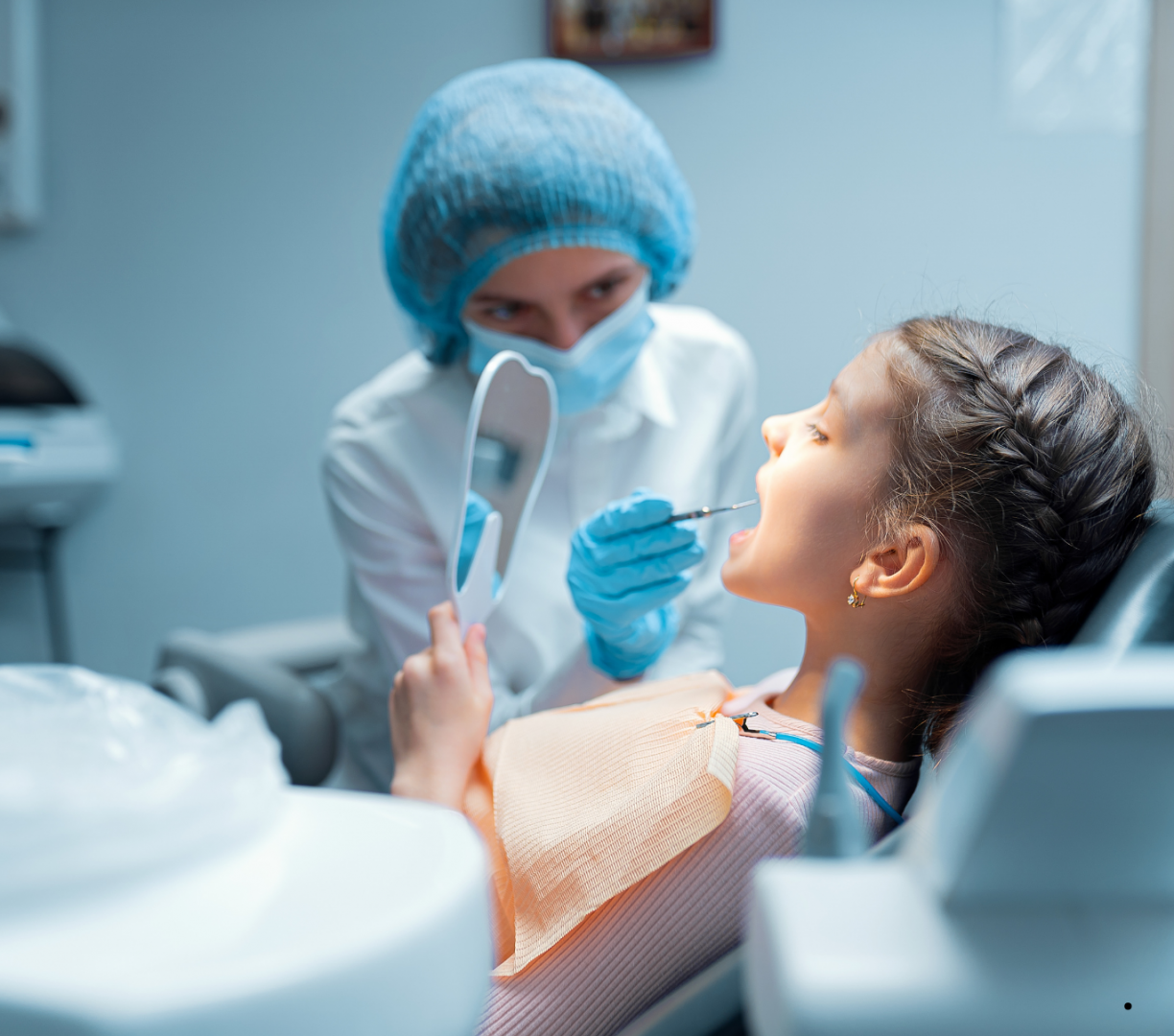 Child receiving a dental examination in a pediatric dentistry setting